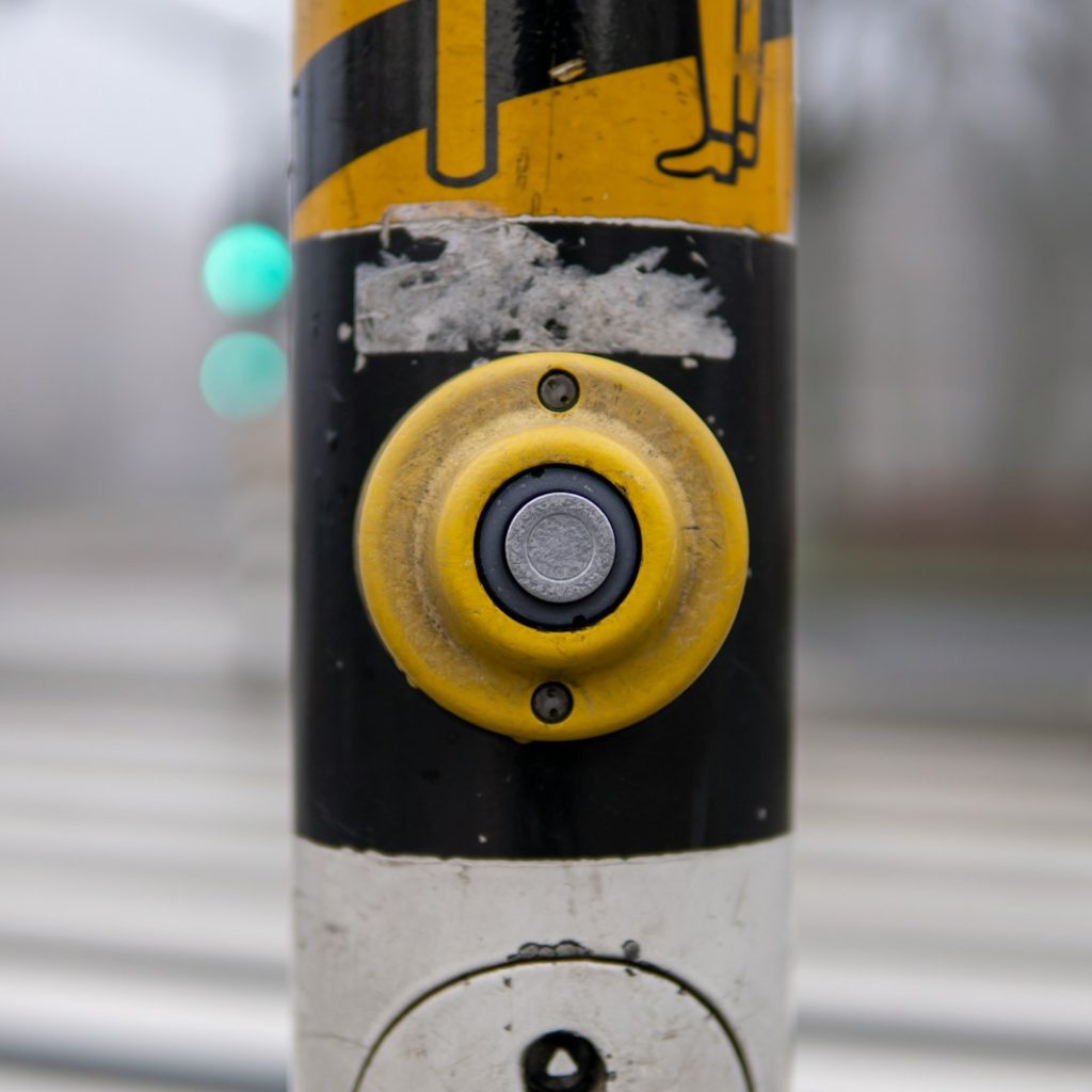 black and yellow emoji printed bottle