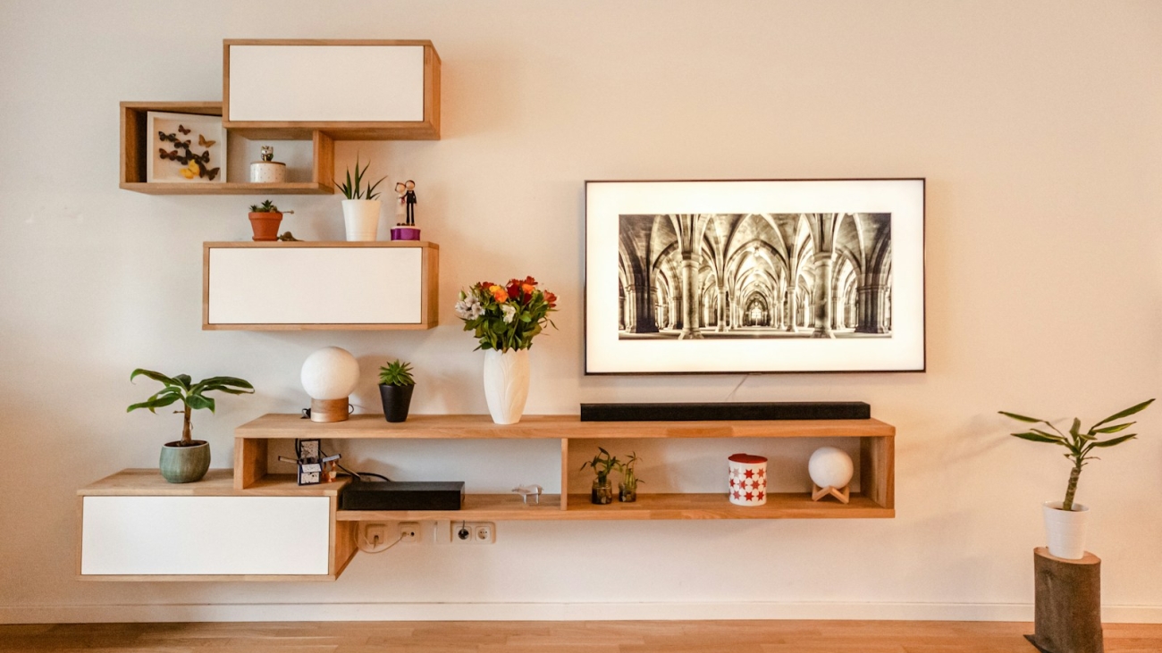 white wooden wall mounted shelf with white wooden frame