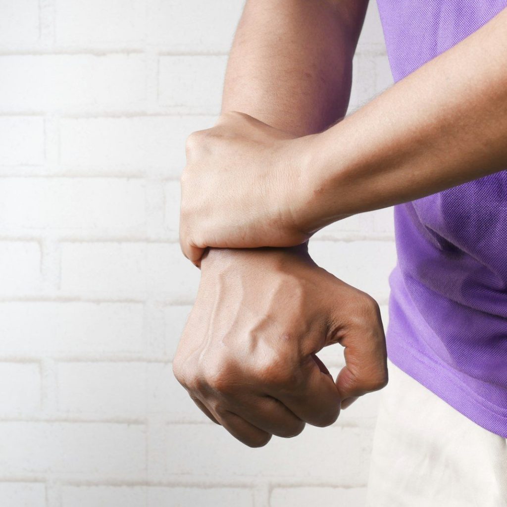 person holding hands of another person